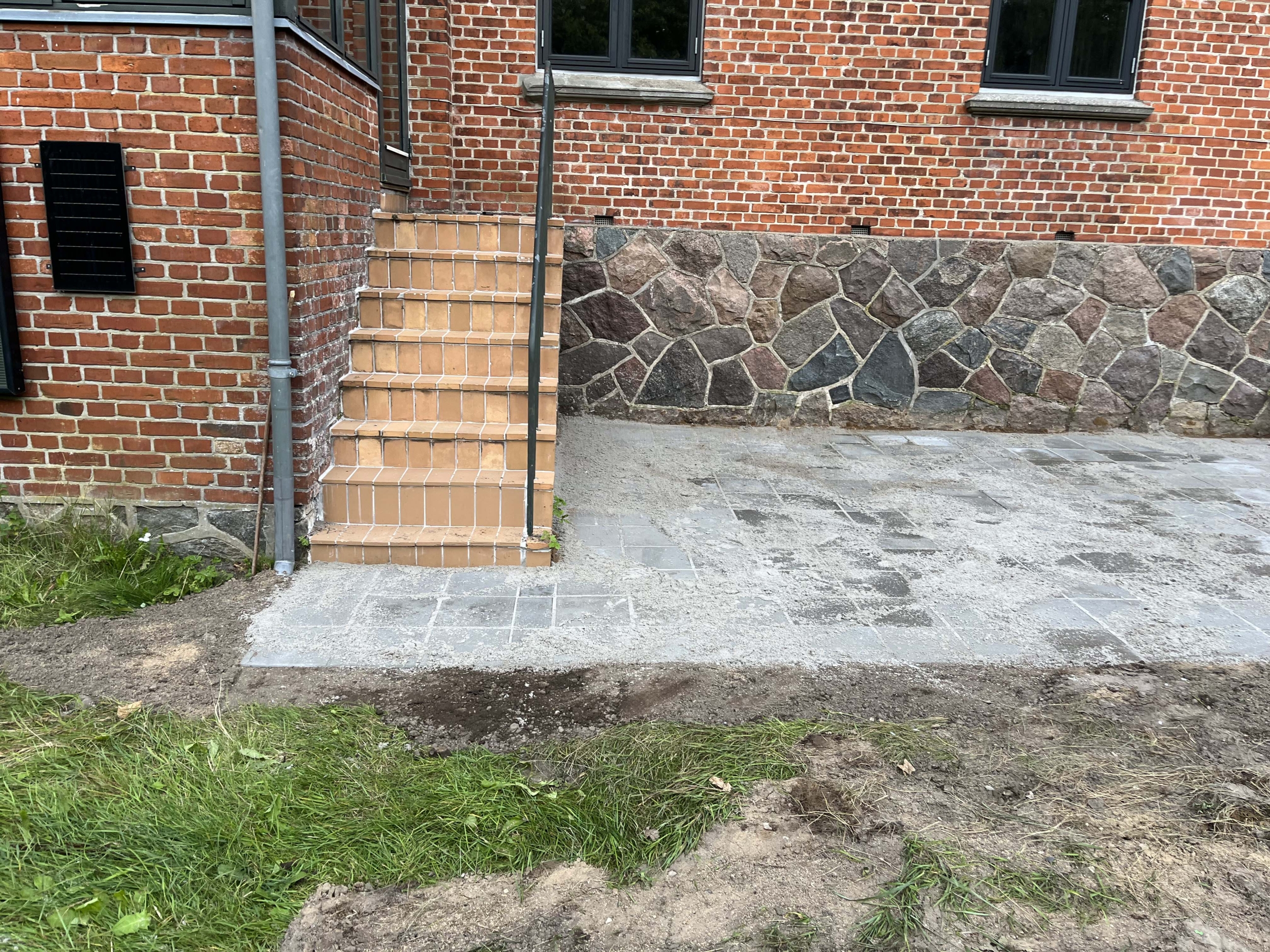 belægning ved trappe